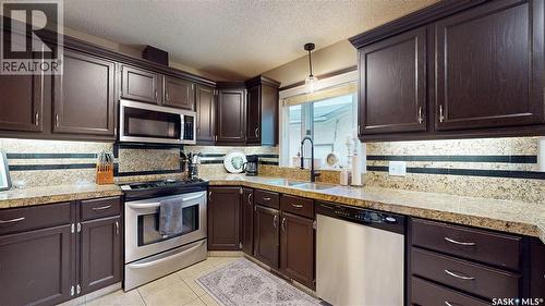 3107 Andreychuk Place E, Regina, SK - Indoor Photo Showing Kitchen With Double Sink
