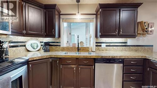 3107 Andreychuk Place E, Regina, SK - Indoor Photo Showing Kitchen With Double Sink