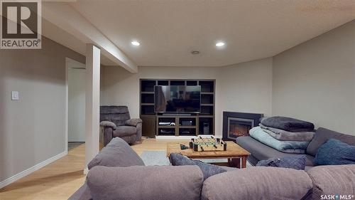 3107 Andreychuk Place E, Regina, SK - Indoor With Fireplace