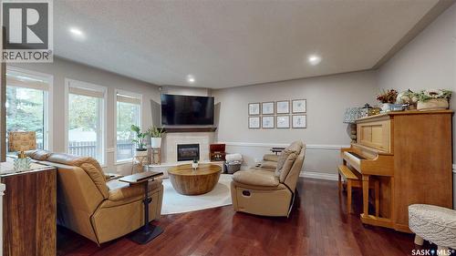 3107 Andreychuk Place E, Regina, SK - Indoor With Fireplace