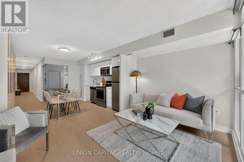 551 - 10 Capreol Court, Toronto, ON - Indoor Photo Showing Living Room