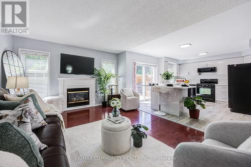 69 Mcsweeney Crescent, Ajax, ON - Indoor Photo Showing Living Room With Fireplace