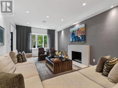 7 Glen Rush Boulevard, Toronto, ON - Indoor Photo Showing Living Room With Fireplace