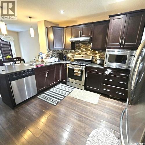 5008 Aerial Crescent, Regina, SK - Indoor Photo Showing Kitchen With Double Sink With Upgraded Kitchen