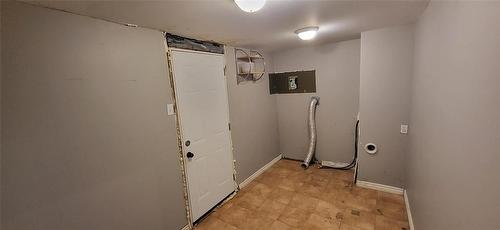 Mudroom/ main floor laundry - 817 12Th Street, Brandon, MB - Indoor Photo Showing Other Room