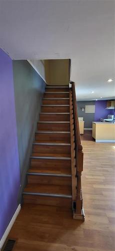 Staircase - 817 12Th Street, Brandon, MB - Indoor Photo Showing Other Room