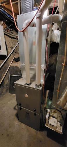 High Efficiency furnace - 817 12Th Street, Brandon, MB - Indoor Photo Showing Basement