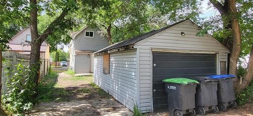 Garage back Lane View - 817 12Th Street, Brandon, MB - Outdoor With Exterior