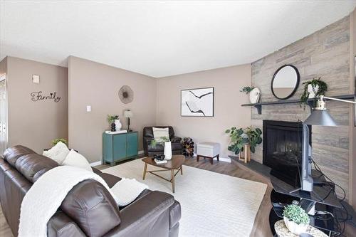 66 Hawkins Cr, Winnipeg, MB - Indoor Photo Showing Living Room With Fireplace