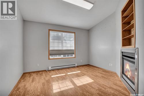 201 Centennial Road, Hague, SK - Indoor Photo Showing Other Room With Fireplace