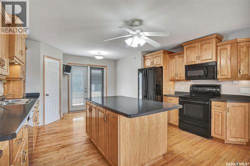 201 Centennial Road, Hague, SK - Indoor Photo Showing Kitchen With Double Sink