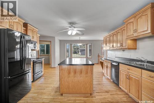 201 Centennial Road, Hague, SK - Indoor Photo Showing Kitchen With Double Sink
