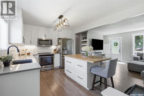 122 Montreal Avenue S, Saskatoon, SK - Indoor Photo Showing Kitchen With Stainless Steel Kitchen With Upgraded Kitchen