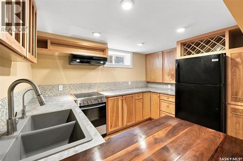 617 7Th Avenue N, Saskatoon, SK - Indoor Photo Showing Kitchen With Double Sink With Upgraded Kitchen