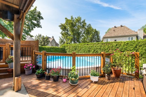 Piscine - 1 Rue Dozois, Candiac, QC - Outdoor With Deck Patio Veranda With Exterior