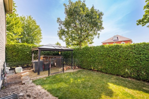 Cour - 1 Rue Dozois, Candiac, QC - Outdoor With Backyard
