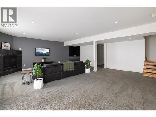 Spacious area - 7261 Silver Ridge Drive, Vernon, BC - Indoor With Fireplace