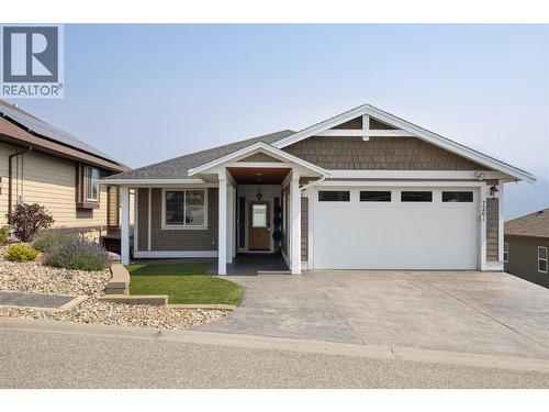 Stamped concrete drive - 7261 Silver Ridge Drive, Vernon, BC - Outdoor With Facade