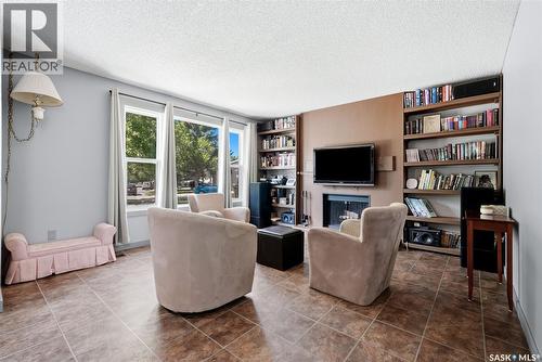 51 Martinac Crescent, Regina, SK - Indoor Photo Showing Living Room With Fireplace