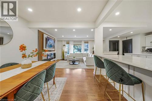 Wood-finish flooring, recessed lighting, and a kitchen island with a light-toned countertop - 24 Garvey Crescent, Hamilton, ON - Indoor