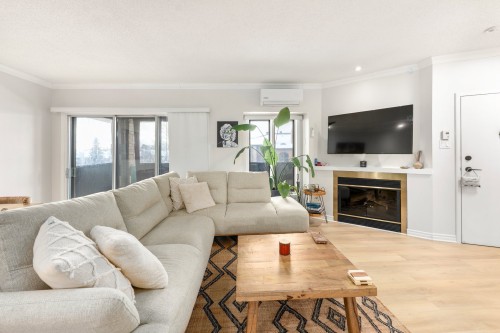 Living Room - 55-435 Boul. Dagenais E., Laval (Vimont), QC - Indoor Photo Showing Living Room With Fireplace
