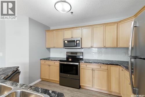 106 6345 Rochdale Boulevard, Regina, SK - Indoor Photo Showing Kitchen