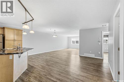 106 6345 Rochdale Boulevard, Regina, SK - Indoor Photo Showing Kitchen