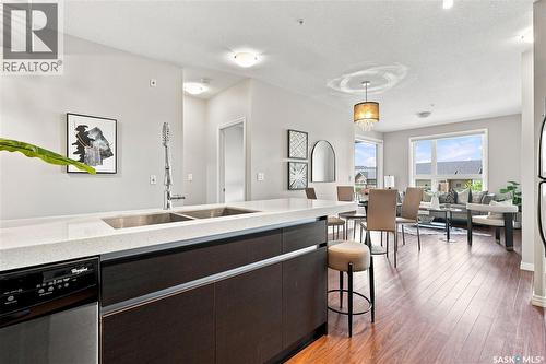 206 225 Maningas Bend, Saskatoon, SK - Indoor Photo Showing Kitchen With Double Sink