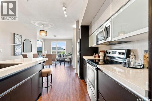 206 225 Maningas Bend, Saskatoon, SK - Indoor Photo Showing Kitchen With Upgraded Kitchen