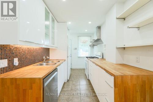 MAIN - 2159 GERRARD STREET E , Toronto, Ontario M4E 2C4 2