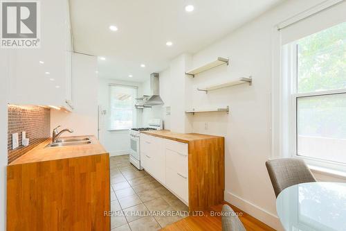 MAIN - 2159 GERRARD STREET E , Toronto, Ontario M4E 2C4 3