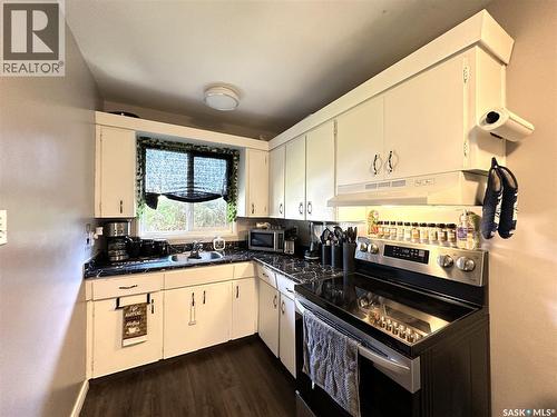 A&B 2818 7Th Street E, Saskatoon, SK - Indoor Photo Showing Kitchen With Double Sink