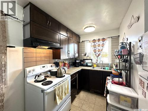 A&B 2818 7Th Street E, Saskatoon, SK - Indoor Photo Showing Kitchen With Double Sink