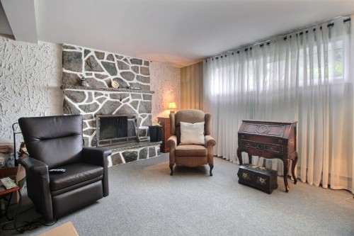 Salle familiale - 270 122E Rue, Shawinigan, QC - Indoor Photo Showing Other Room With Fireplace