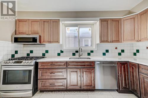 Main Kitchen - 1228 Jane Street N, Toronto, ON - Indoor Photo Showing Kitchen With Double Sink