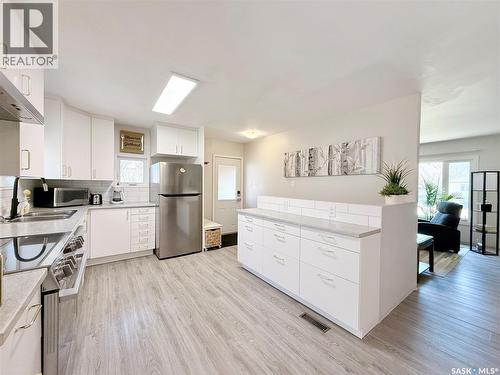 219 Thomson Street, Outlook, SK - Indoor Photo Showing Kitchen With Double Sink