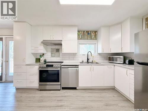 219 Thomson Street, Outlook, SK - Indoor Photo Showing Kitchen With Double Sink
