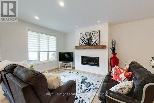 37 Foliage Drive, Tiny, ON - Indoor Photo Showing Living Room With Fireplace