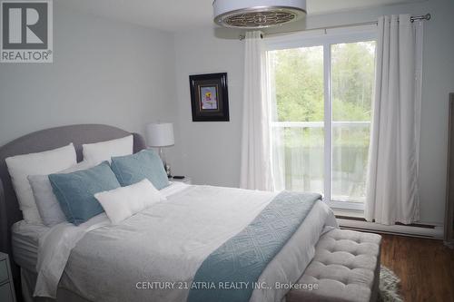 24 - 4 Paradise Boulevard, Ramara, ON - Indoor Photo Showing Bedroom