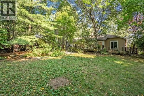 Expansive lawn with mature trees and established landscaping - 4189 Inglewood Drive, Burlington, ON - Outdoor