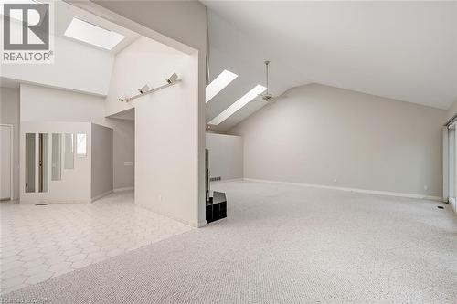 Vaulted ceilings with multiple skylights, track lighting, and a ceiling fan - 4189 Inglewood Drive, Burlington, ON -  Photo Showing Other Room