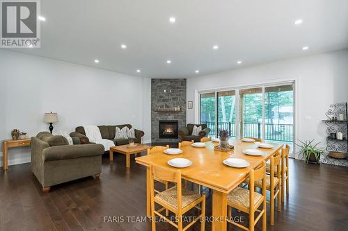 34 Oakwood Avenue, Tiny, ON - Indoor Photo Showing Living Room With Fireplace