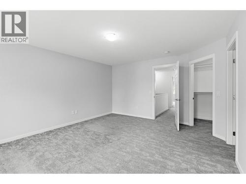 Primary bedroom - 680 Old Meadows Road Unit# 74, Kelowna, BC - Indoor Photo Showing Other Room