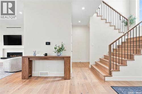 652 Pepper Bend, Saskatoon, SK - Indoor Photo Showing Other Room With Fireplace