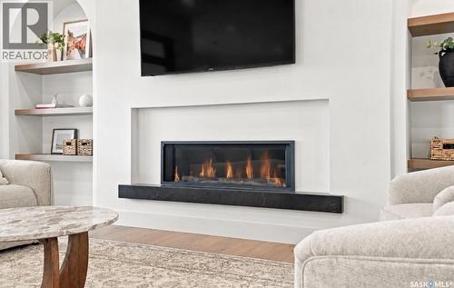 652 Pepper Bend, Saskatoon, SK - Indoor Photo Showing Living Room With Fireplace