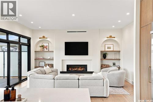 652 Pepper Bend, Saskatoon, SK - Indoor Photo Showing Living Room With Fireplace