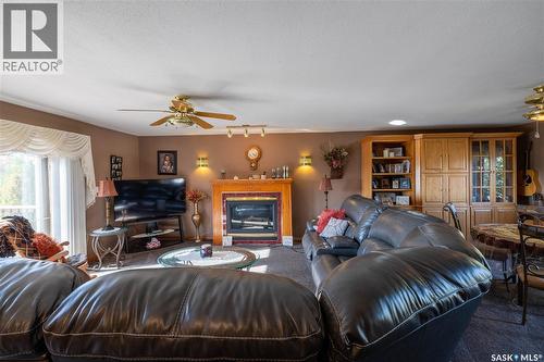 304 1St Street W, Milden, SK - Indoor Photo Showing Living Room With Fireplace
