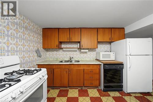 44 Tom Street, Hamilton, ON - Indoor Photo Showing Kitchen With Double Sink