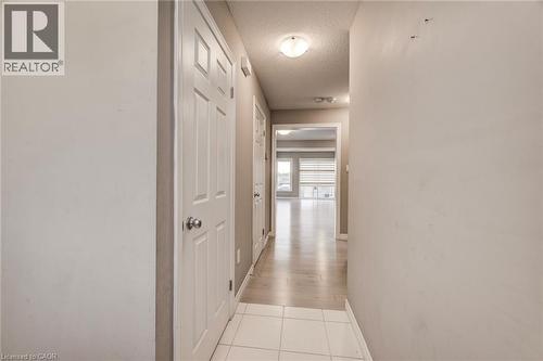 hallway from foyer - 77 John Brabson Crescent, Guelph, ON - Indoor Photo Showing Other Room
