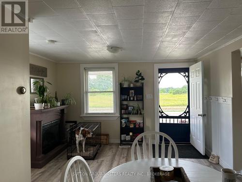 1609 County Road 42 Road, Rideau Lakes, ON - Indoor Photo Showing Dining Room With Fireplace
